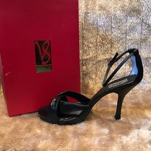 Black sandals with heels and ankle strap